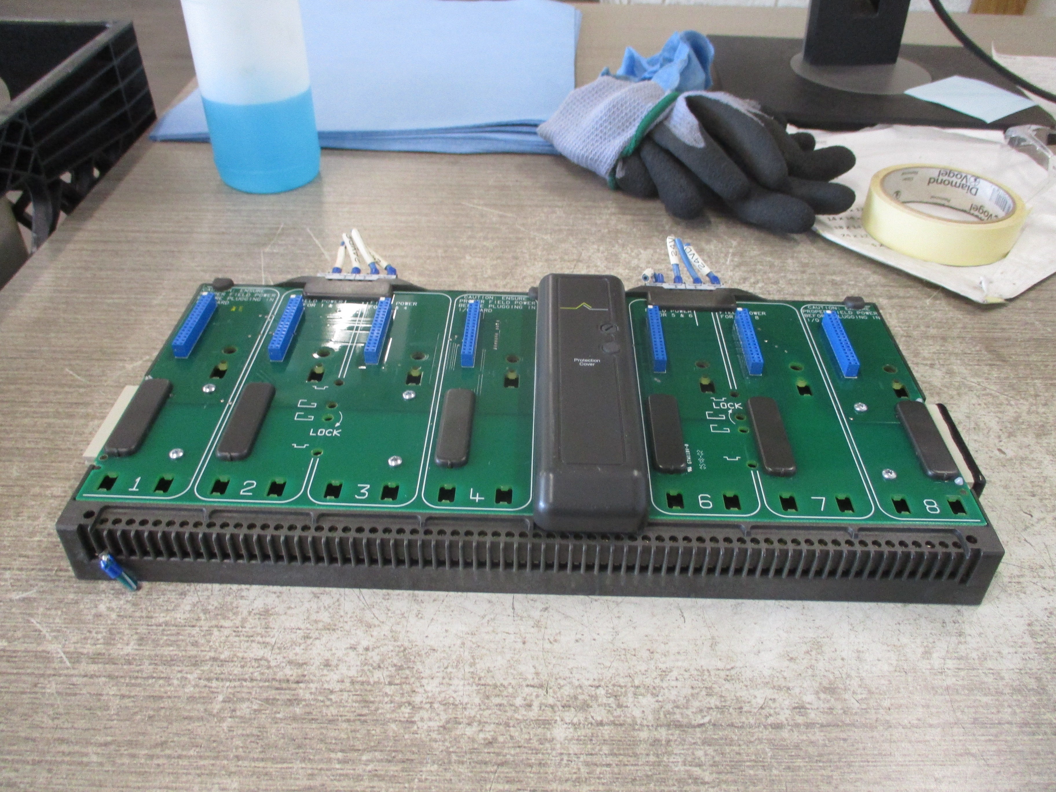 Emerson KJ4001X1-BE1 8-Wide Carrier 12P0818X072 Rev L Localbus: 12.6VDC, 8A Used