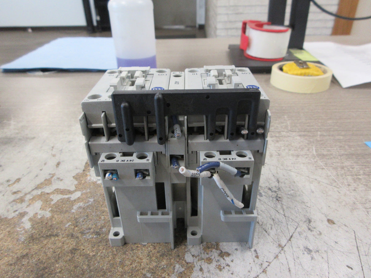 Allen-Bradley Reversing Contactor 104-C09DJ22 Ser. B 24VDC Coil 25A 600V Used