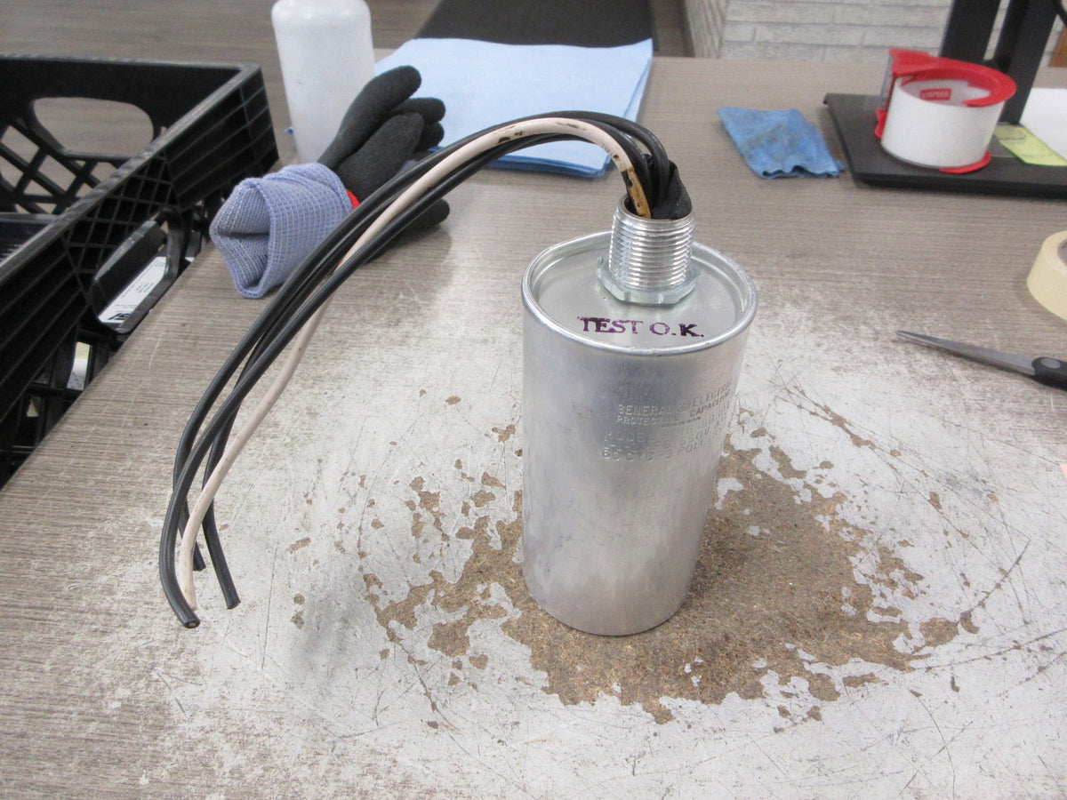 GE Capacitor 9L18BBB301 1-1-1 MFD 650V 60Hz 3P Used