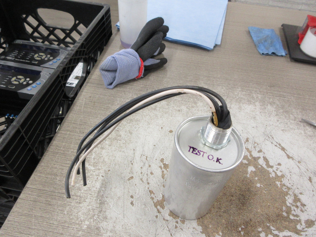 GE Capacitor 9L18BBB301 1-1-1 MFD 650V 60Hz 3P Used