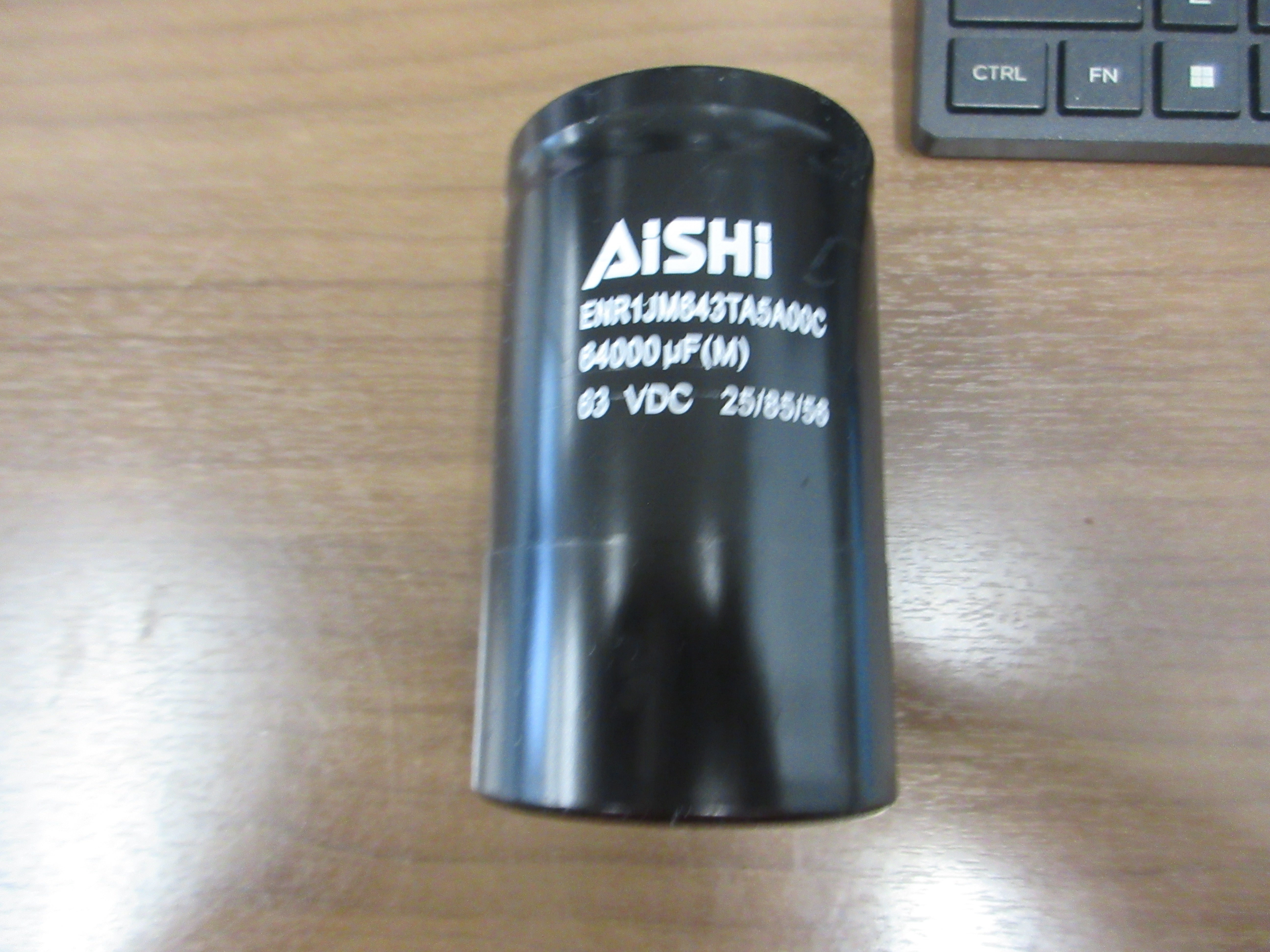 Aishi Capacitor ENR1JMG43TA5A00C 64,000uF 63VDC Used